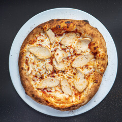 pizza on the black background, top view
