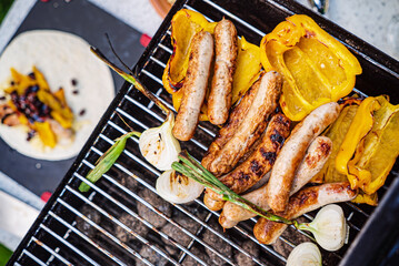 grilled sausage and vegetables outdoor