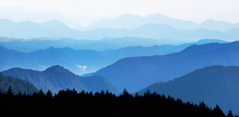 Misty view of the blue mountain range -  Beautiful landscape with cascade blue mountains at the morning