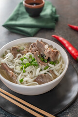  udon wheat noodles with boiled  offal and  broth.