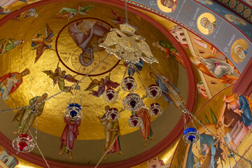 The large golden double-headed eagle atop a chandelier in the main hall of the Church of the Apostles not far from Tiberias city in northern Israel