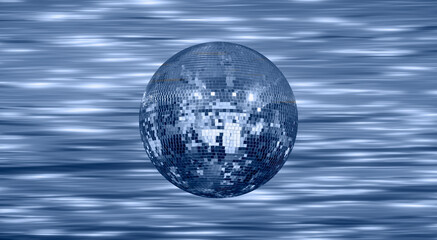Fototapeta na wymiar Party disco mirror ball reflecting colorful lights 