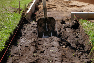 Leveling ground for the footpath