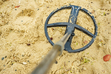 metal detector on sea beach