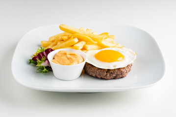 cutlet with egg and french fries