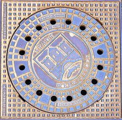 Metal canal cover with the coat of arms of the city of Wernigerode. Saxony-Anhalt, Germany