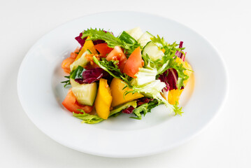 vegetable salad on the white plate