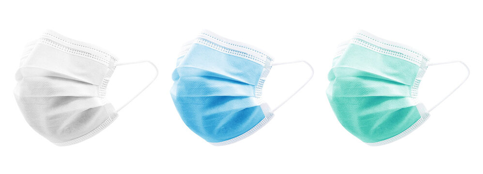 Blue, White & Green colour high density 3 ply non woven disposable surgical face mask with elastic ear loops isolated on white background. Eliminates bacteria & pollen. Studio Photography