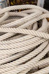 Fototapeta na wymiar pattern background thin rope white braided multi rope curved design base