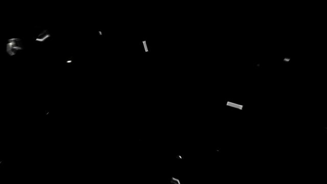 Glass breaking in slow motion on black background. Hammer breaking Pane of Glass against Black Background, Slow Motion.