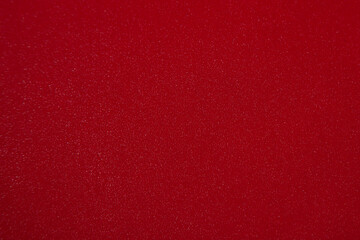 Red glittering glitter  blurred background