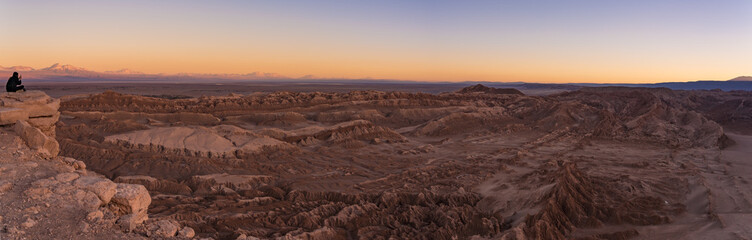 Fototapeta na wymiar Looking sunset at Moon Valley Valle de la luna near San Pedro de Atacama in Chile.