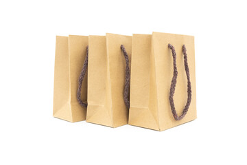 A set of kraft paper tote bags isolated on white background