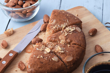 Banana cake with almond nut topping
