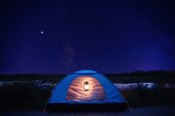 A blue tent under beautiful  sky background.