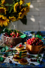 Obraz na płótnie Canvas Pancakes with cherry.style rustic .selective focus