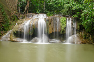 Fototapeta na wymiar Erawan waterfall in the Erawan National Park, Thailand, Asia