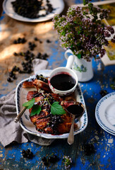 Pork belly with black currant sauce.style rustic.