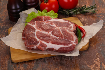 Raw pork neck steak