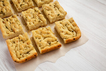 Home-baked Rosemary Garlic Focaccia Bread, side view. Copy space.