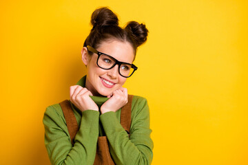 Close-up portrait of her she nice attractive pretty lovely cheerful cheery girl wearing cosy comfy pullover enjoying isolated bright vivid shine vibrant yellow color background