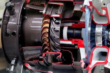 Cut away details of mall turbo jet engine.