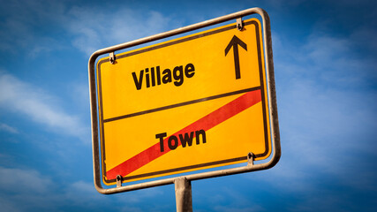 Street Sign to Village versus Town