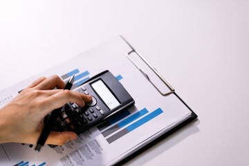 business woman working with calculator