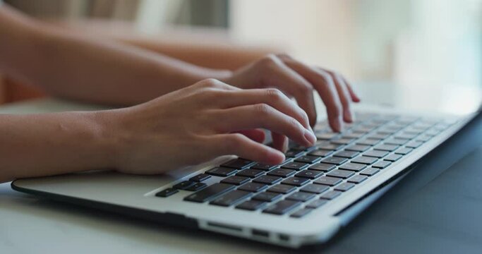 Woman work on laptop computer at home