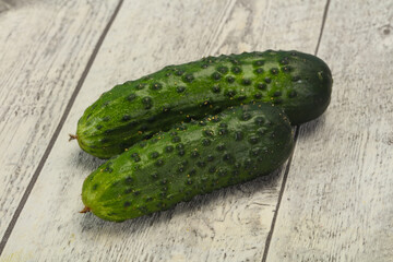 Ripe fresh green two cucumbers
