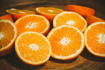 Bunch of fresh sliced oranges on a tray