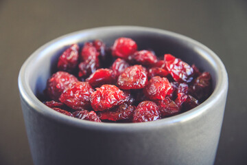 Cranberries in a bowl on a kitchen table