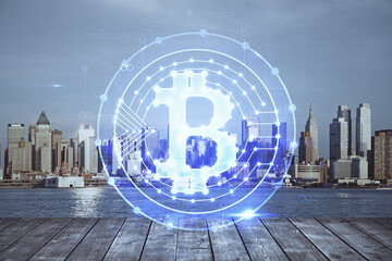 Double exposure of crypto currency theme hologram drawing and city veiw background. Concept of...