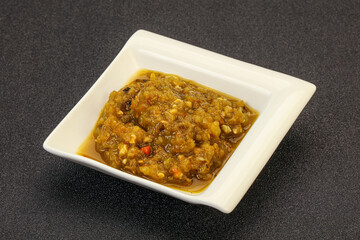 Green spicy sauce in the bowl