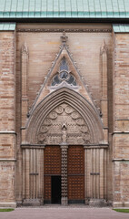 Gothic cathedral entrance, one door open