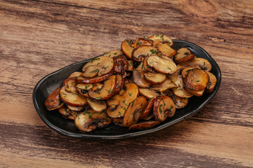 Roasted champignon with herbs and spices