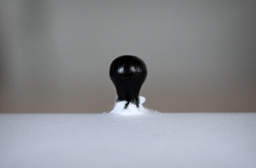 Black pawn breaking through white ground