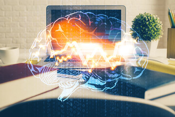Double exposure of work space with computer and human brain drawing hologram. Brainstorm concept.