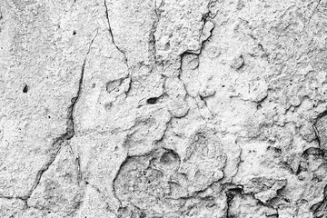 Texture of a concrete wall with cracks and scratches