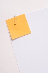 Blank paper memo with clip on white background
