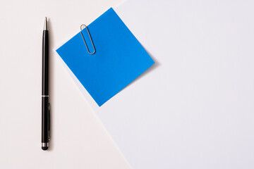 Blank paper memo with clip on white background
