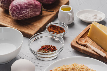 Healthy food concept. Ingredients and cooking utensils for making delicious eggplants.