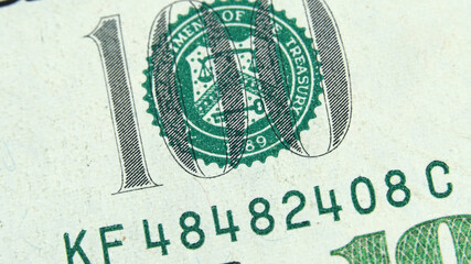 Element of American cash banknote 100 dollars. Macro photography