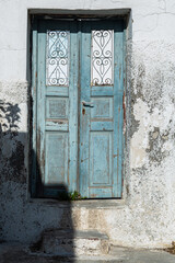 old style wooden doors and windows in greece santorini
