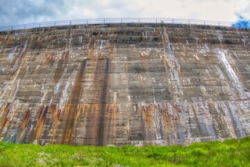Looking up at the huge dam wall of Blackwater reservoir dam 