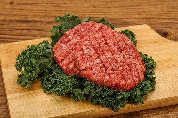 Raw beef burger cutlet for cooking