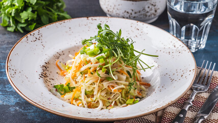Cabbage  salad with sour cream. Vegetable salad on a plate