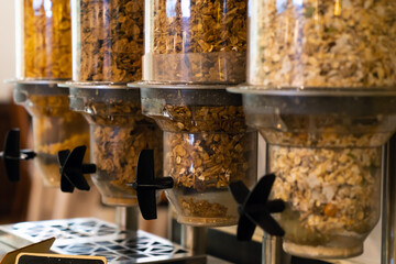 Cereal in glass refill at buffet restaurant. Cereal buffet self service in morning at hotel.