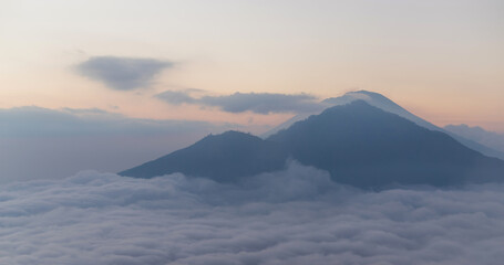 Fototapeta na wymiar Scenic view of clouds and mist at sunrise