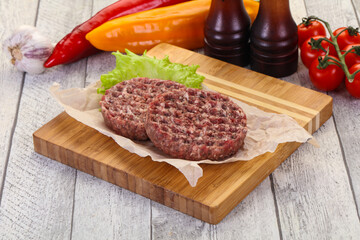 Raw burger cutlet